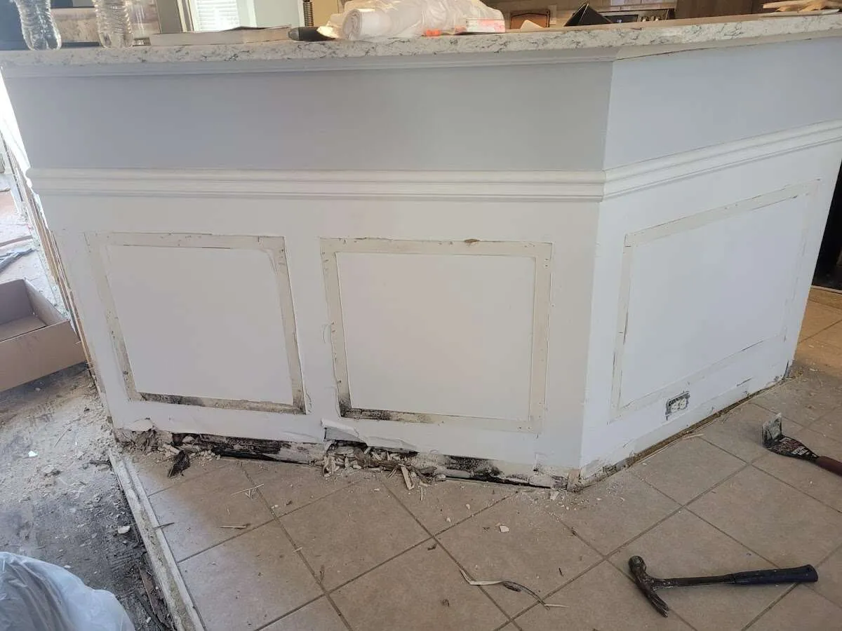 Water damage and mold on kitchen during Storm Damage Restoration in Seekonk
